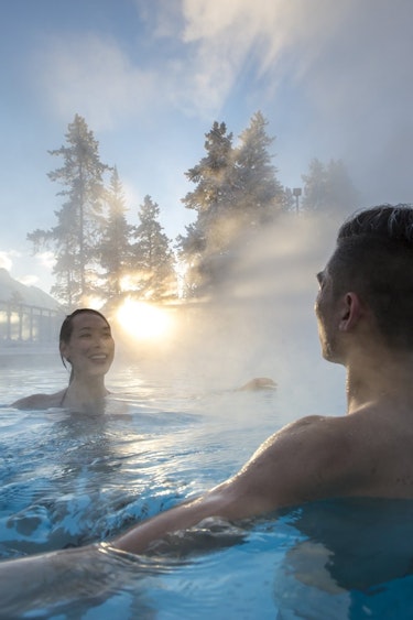 ca_couples_winter banff upper hot springs