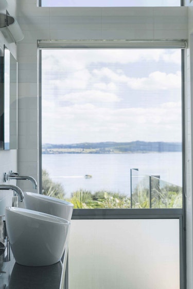 Nz bay of islands villa bathroom view family stays luxury