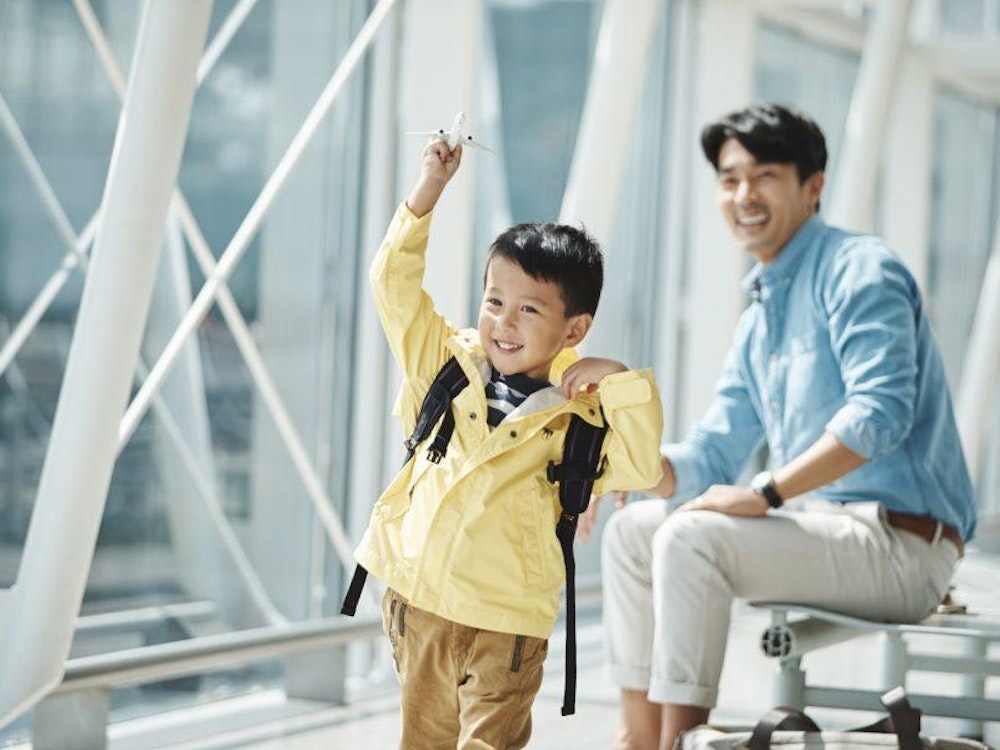 flights cathay pacific children travelling with kids airport