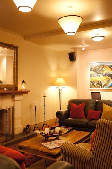 Nz queenstown boutique hotel living fireplace solo stays luxury