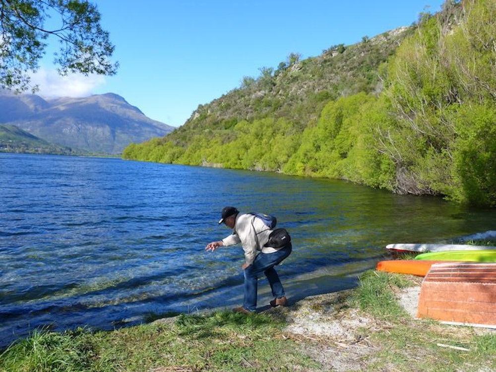 Skimming rocks across the lake, Makarora