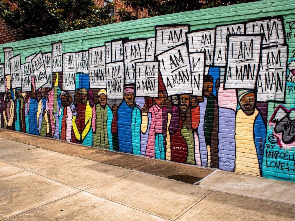 Muurschildering mannen die protesteren in Memphis Tennessee
